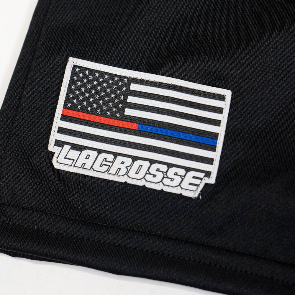 unltd X StringKing BlueRed limited Edition Monarch lacrosse shorts zoomed in on embroidered RedBlue flag