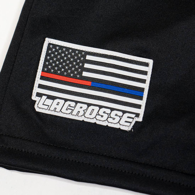 unltd X StringKing BlueRed limited Edition Monarch lacrosse shorts zoomed in on embroidered RedBlue flag