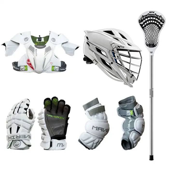 A collection of lacrosse equipment including a white and silver helmet, white gloves, white and gray arm pads, a complete lacrosse stick with white netting, and white shoulder pads.