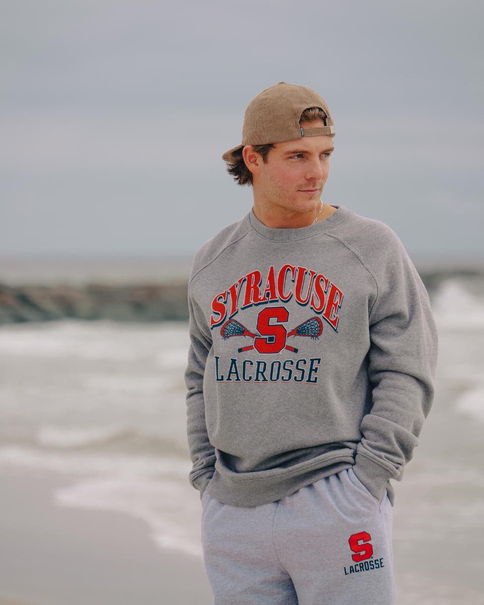 Syracuse crew neck on model on the beach.