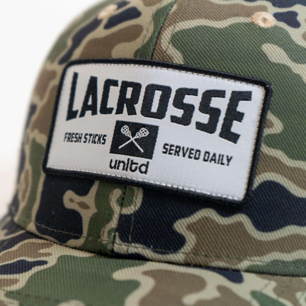 camo sticks lacrosse hat zoomed in