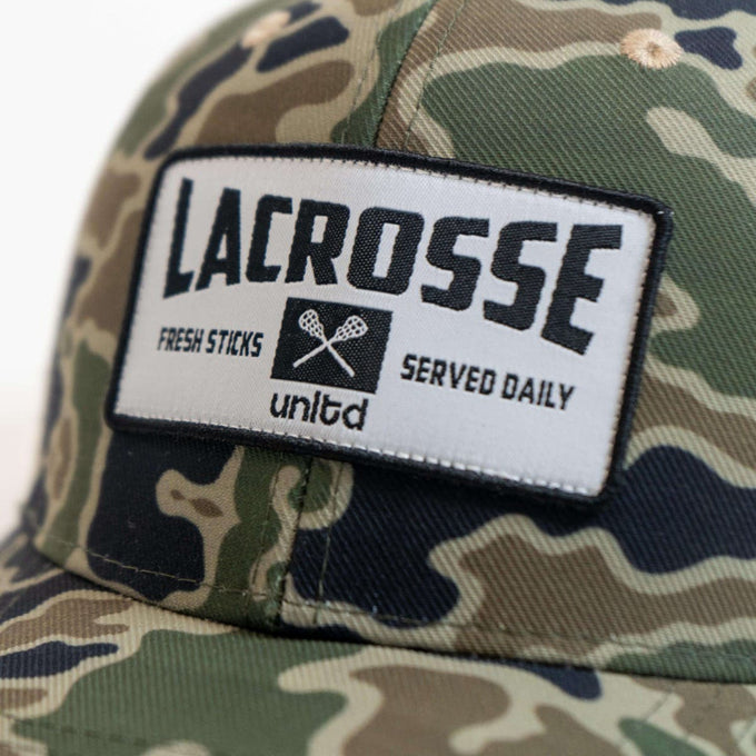 camo sticks lacrosse hat zoomed in
