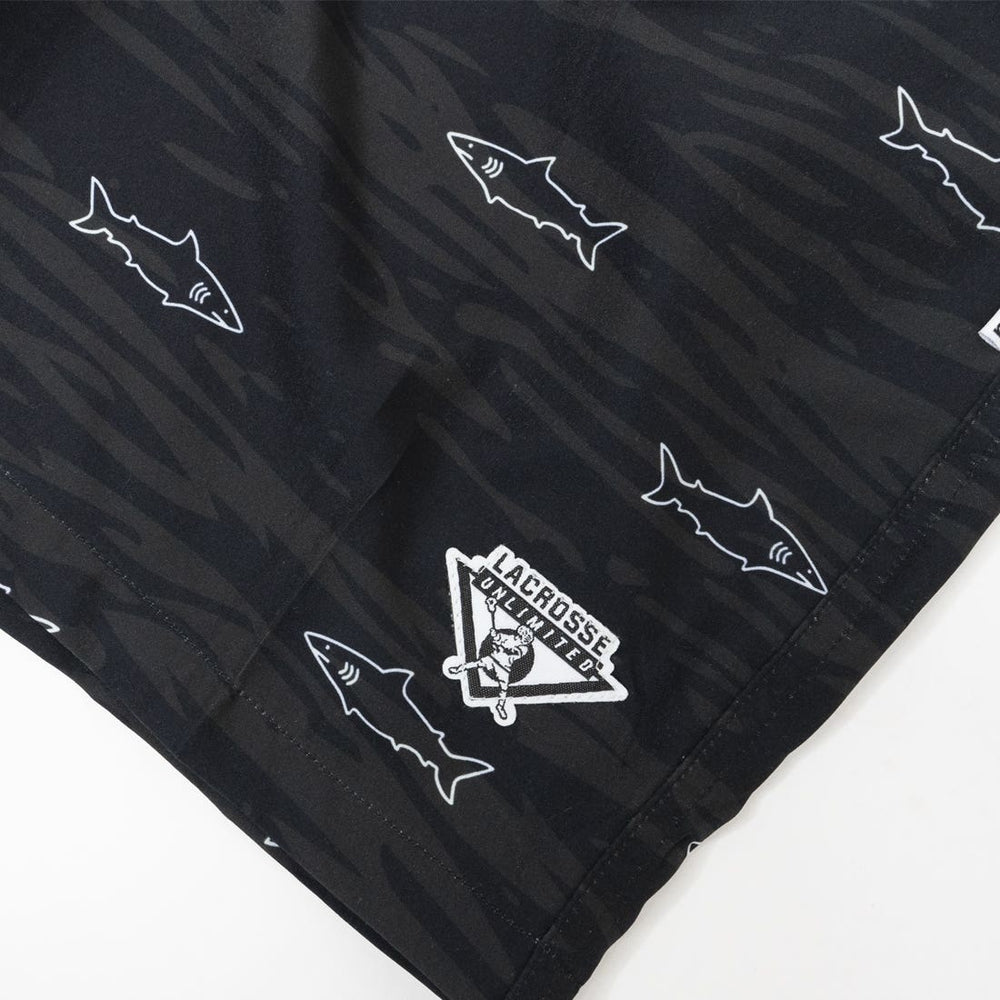 Shark Swim Dodge Lacrosse Shorts front leg logo zoomed in detail
