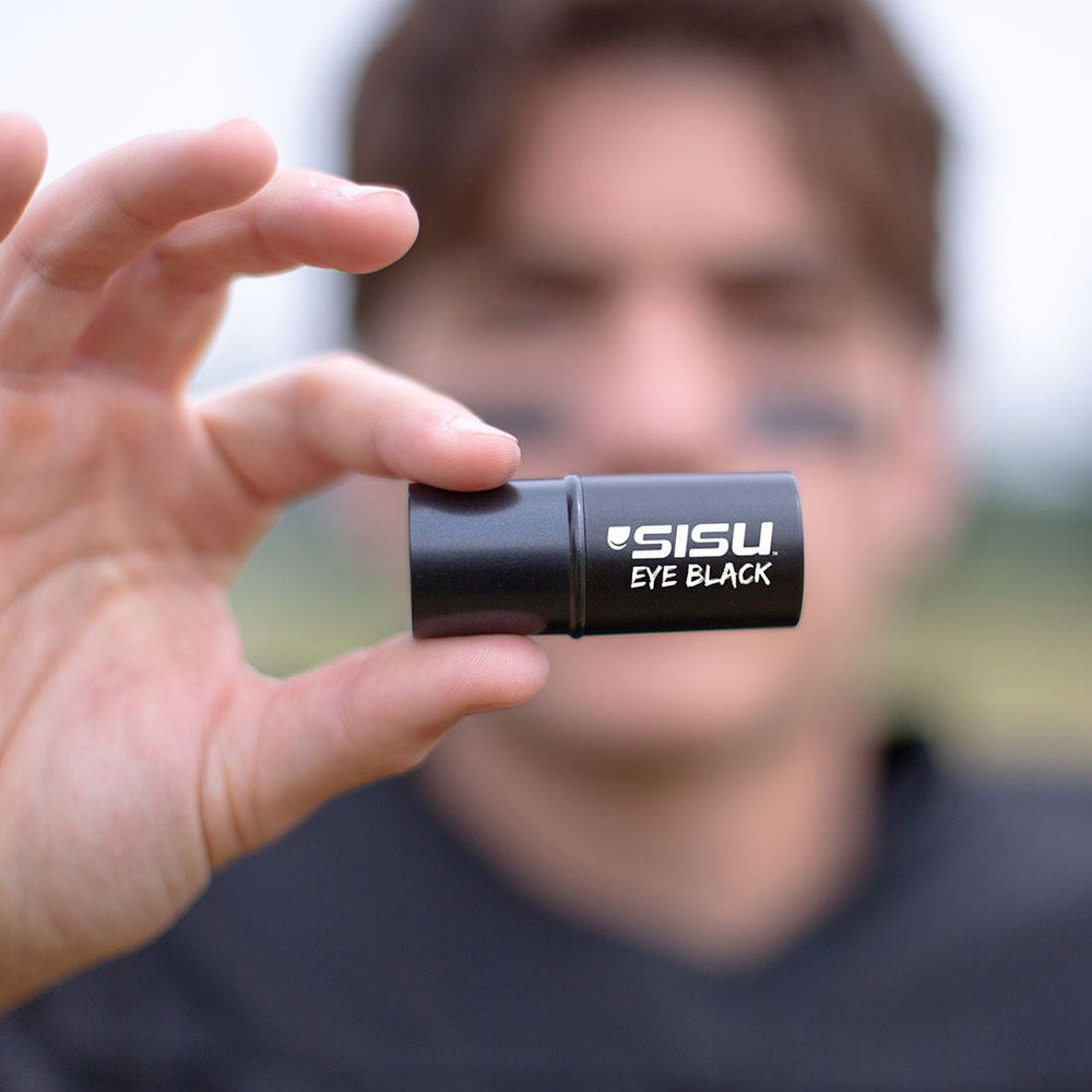 athlete holding SISU eye  black