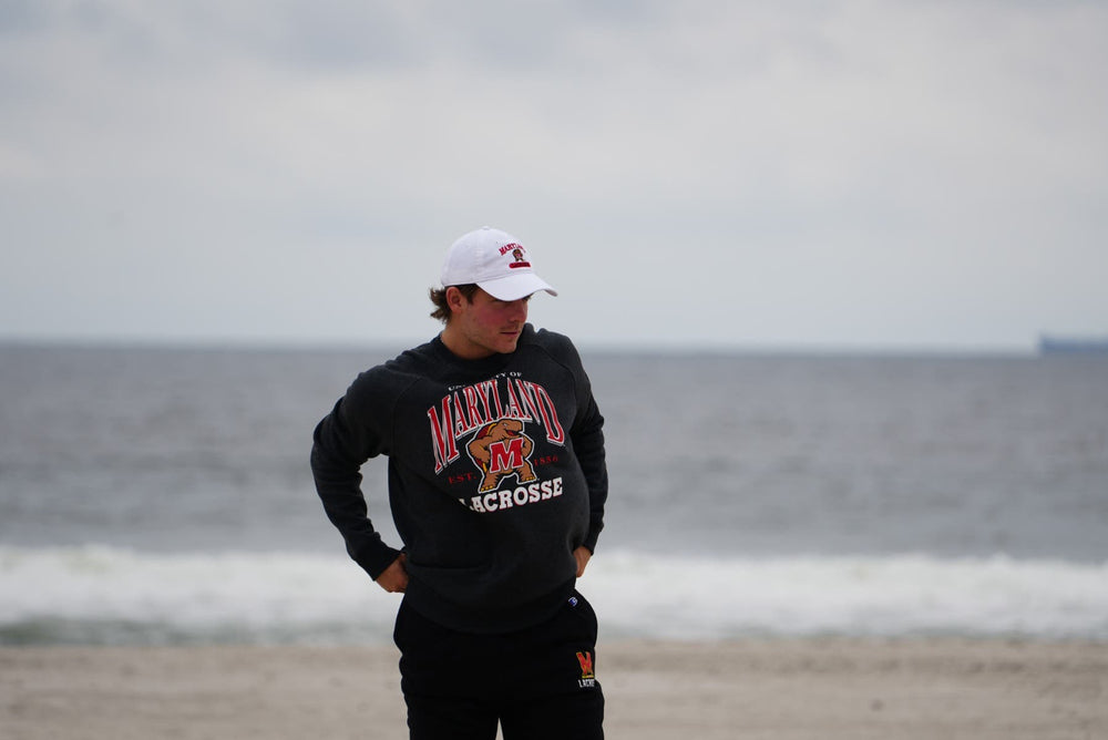 Maryland Lacrosse Crew neck on model at the beach