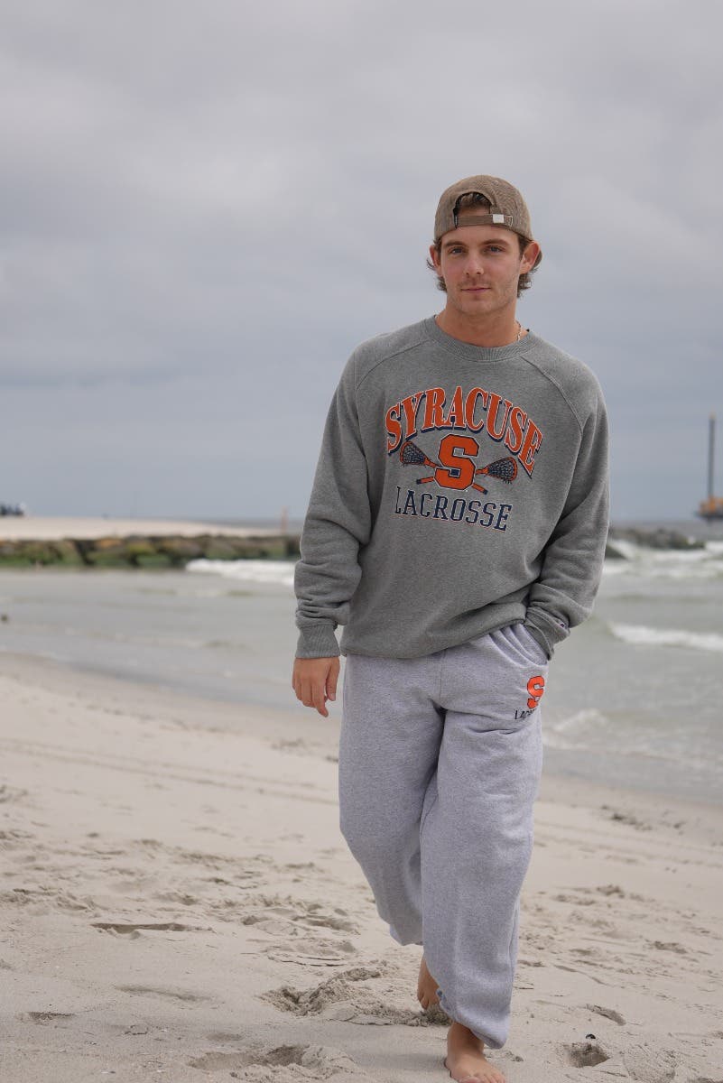 Syracuse crew neck on model at the beach