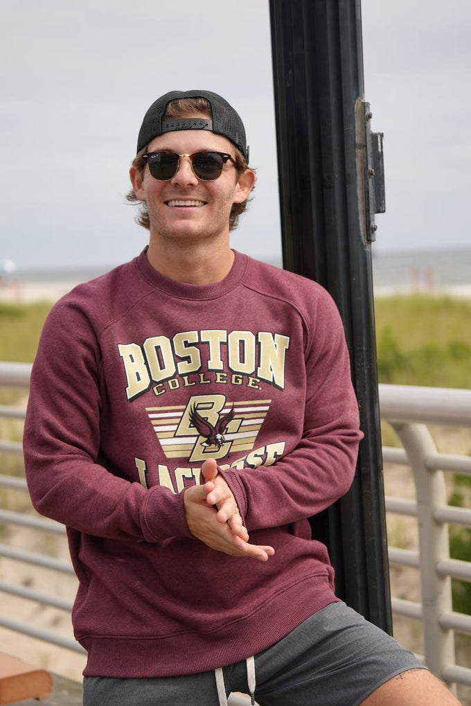 Boston College Lacrosse Crew Neck on model on the boardwalk at the beach