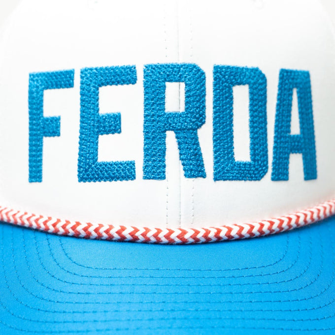 Ferda Lacrosse Hat zoomed in on stitched logo