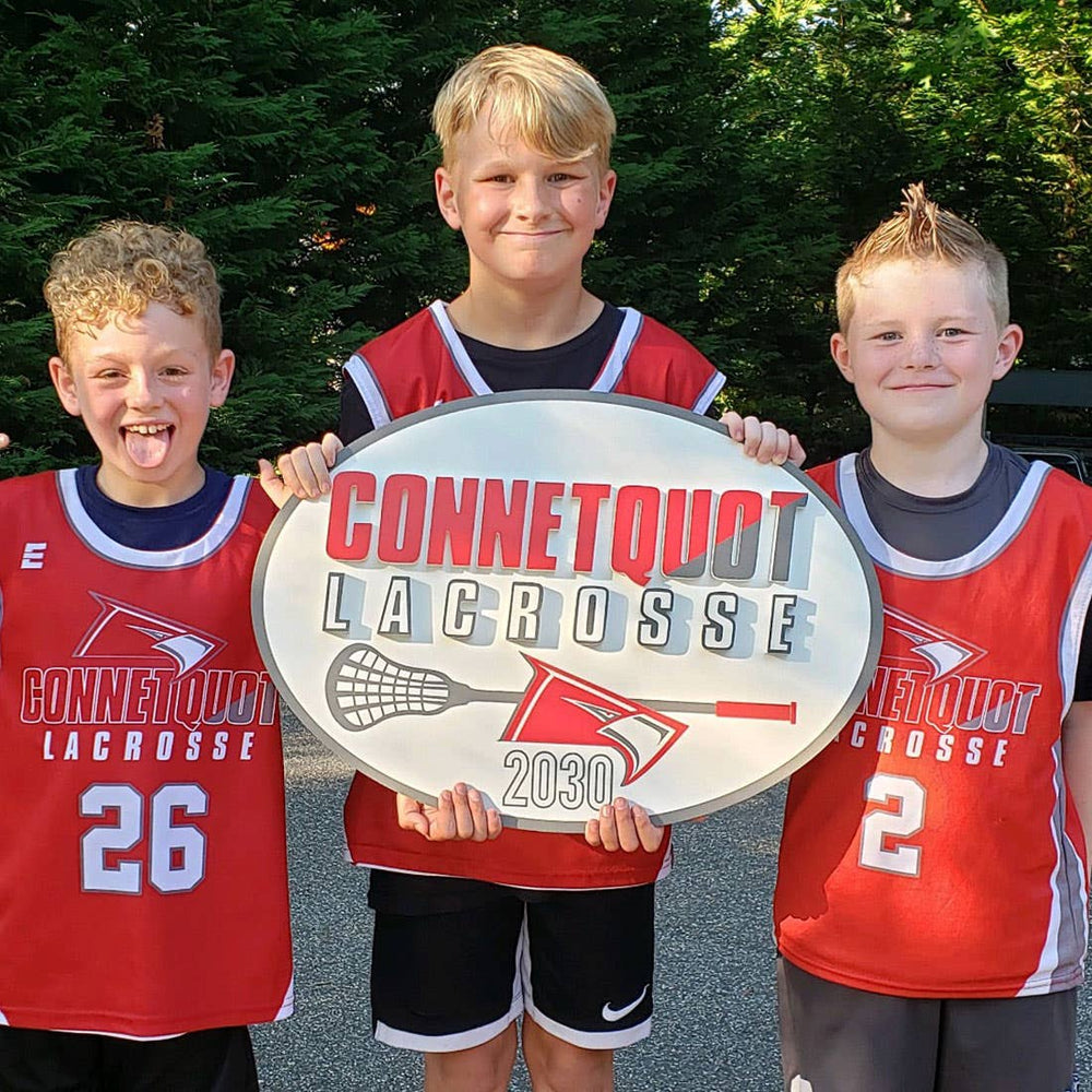 Connetquot Lacrosse Custom Sign held by customers
