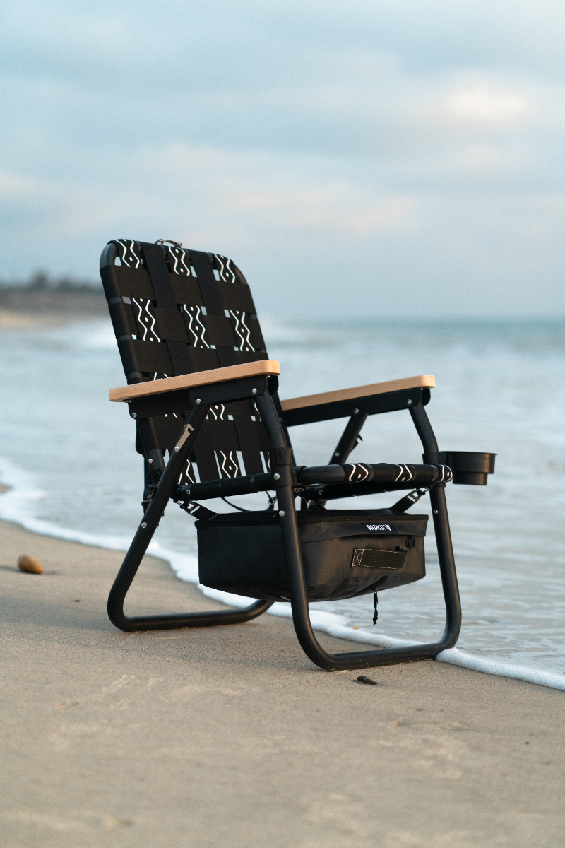 PARKIT Voyager adventure chair on the beach with tide coming in