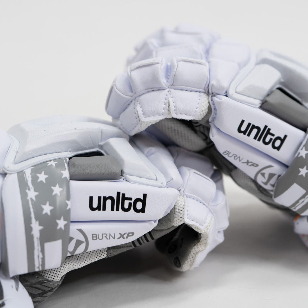 Warrior Burn XP 2 LE USA Lacrosse Glove zoomed in on branding design