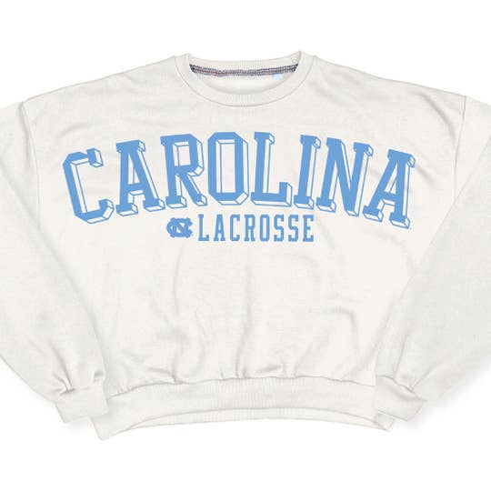 Carolina Lacrosse in blue script on white crew neck frontal view