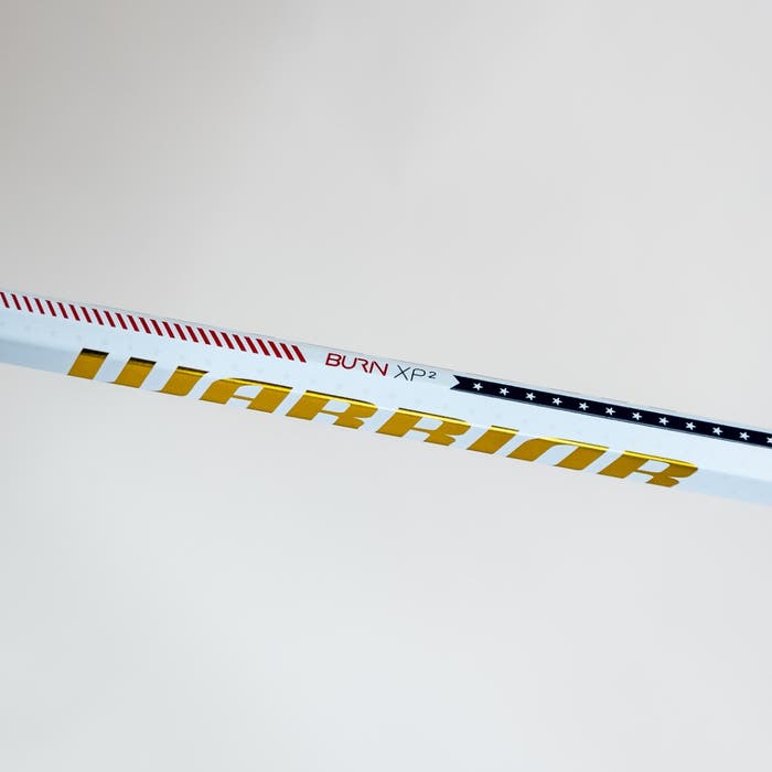 unltd x Warrior Burn XP2 Gold USA Lacrosse Shaft zoomed in on details